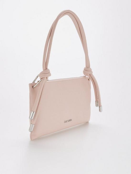 back image of calvin-klein-roped-clutch-pink