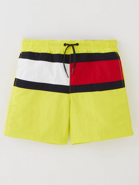 front image of tommy-hilfiger-boys-flag-swim-shorts-yellow