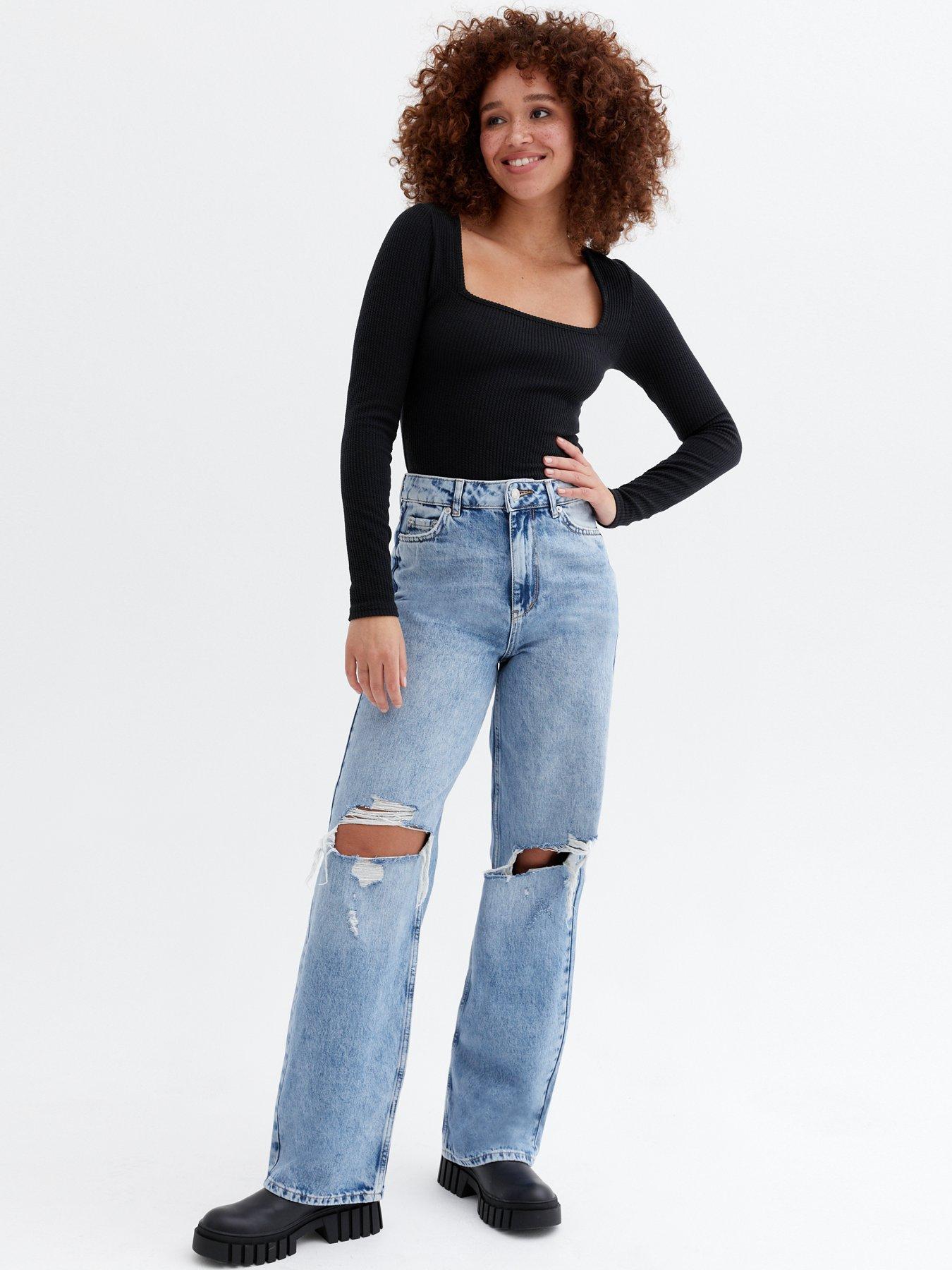 baggy jeans with knee rips