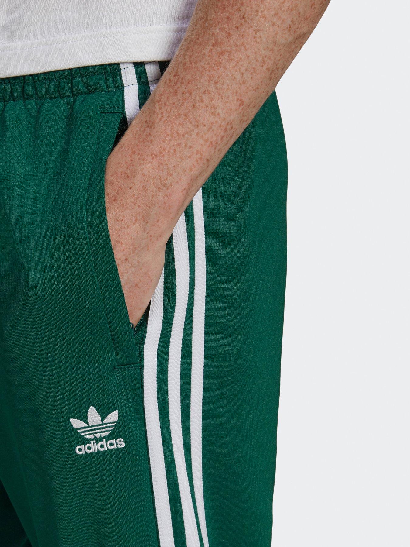 Green adidas 2024 sst track pants