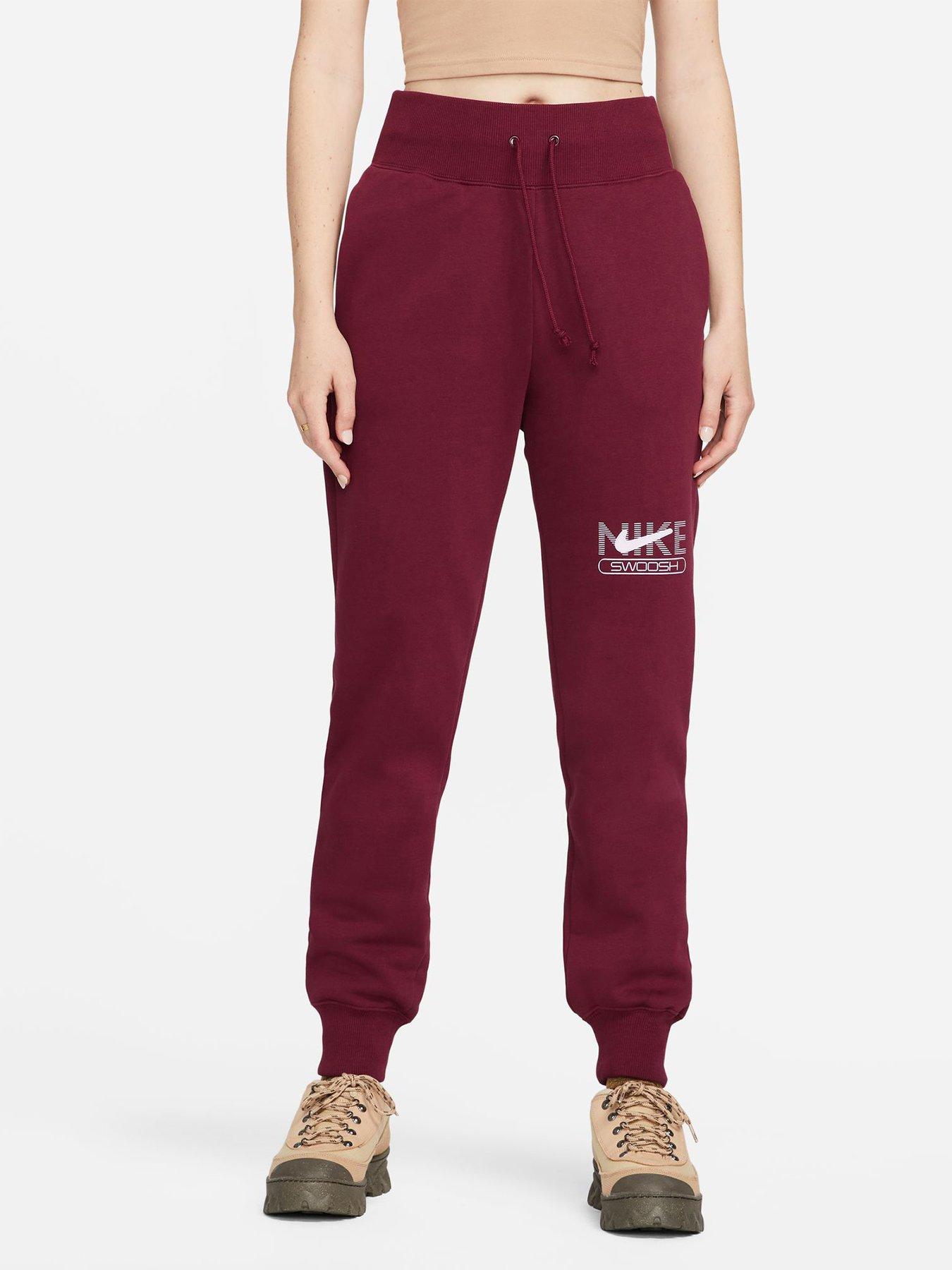 Nike swoosh joggers online red