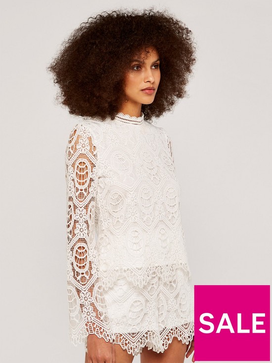 front image of apricot-guipure-scallop-lace-high-neck-top