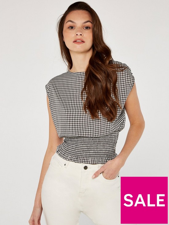 front image of apricot-gingham-smocked-waist-top
