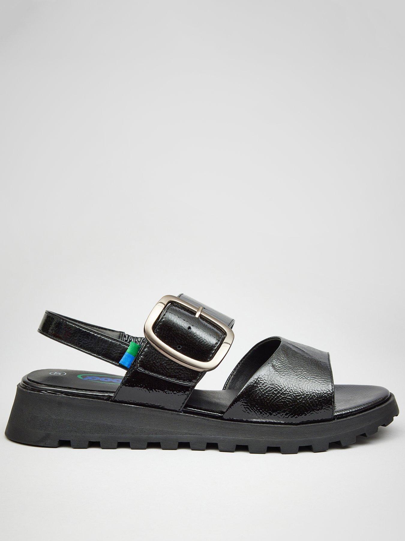 Patent store flat sandals