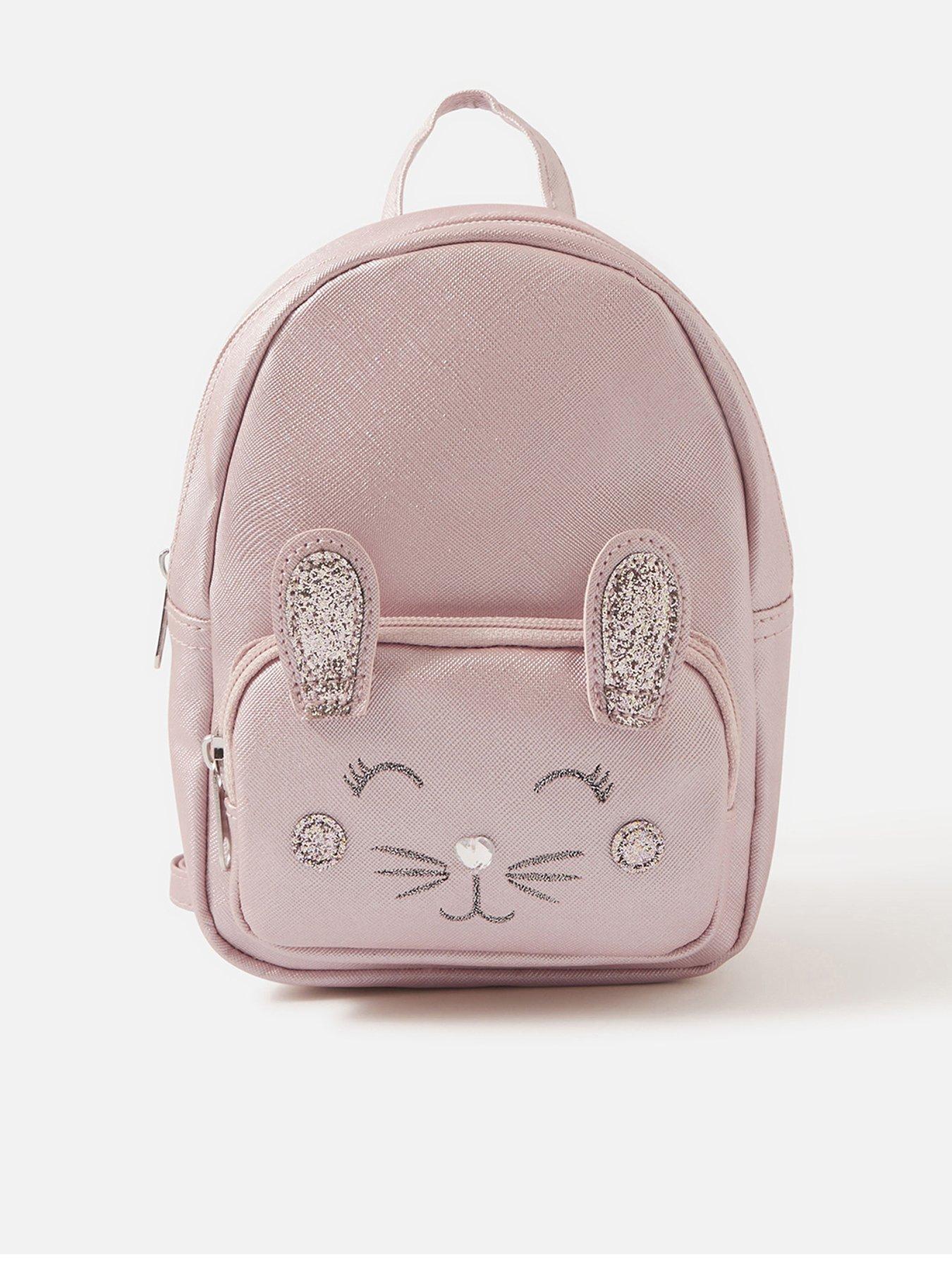 small girl backpacks