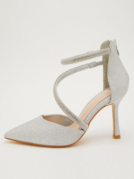 quiz-shimmer-asymmetric-court-heels