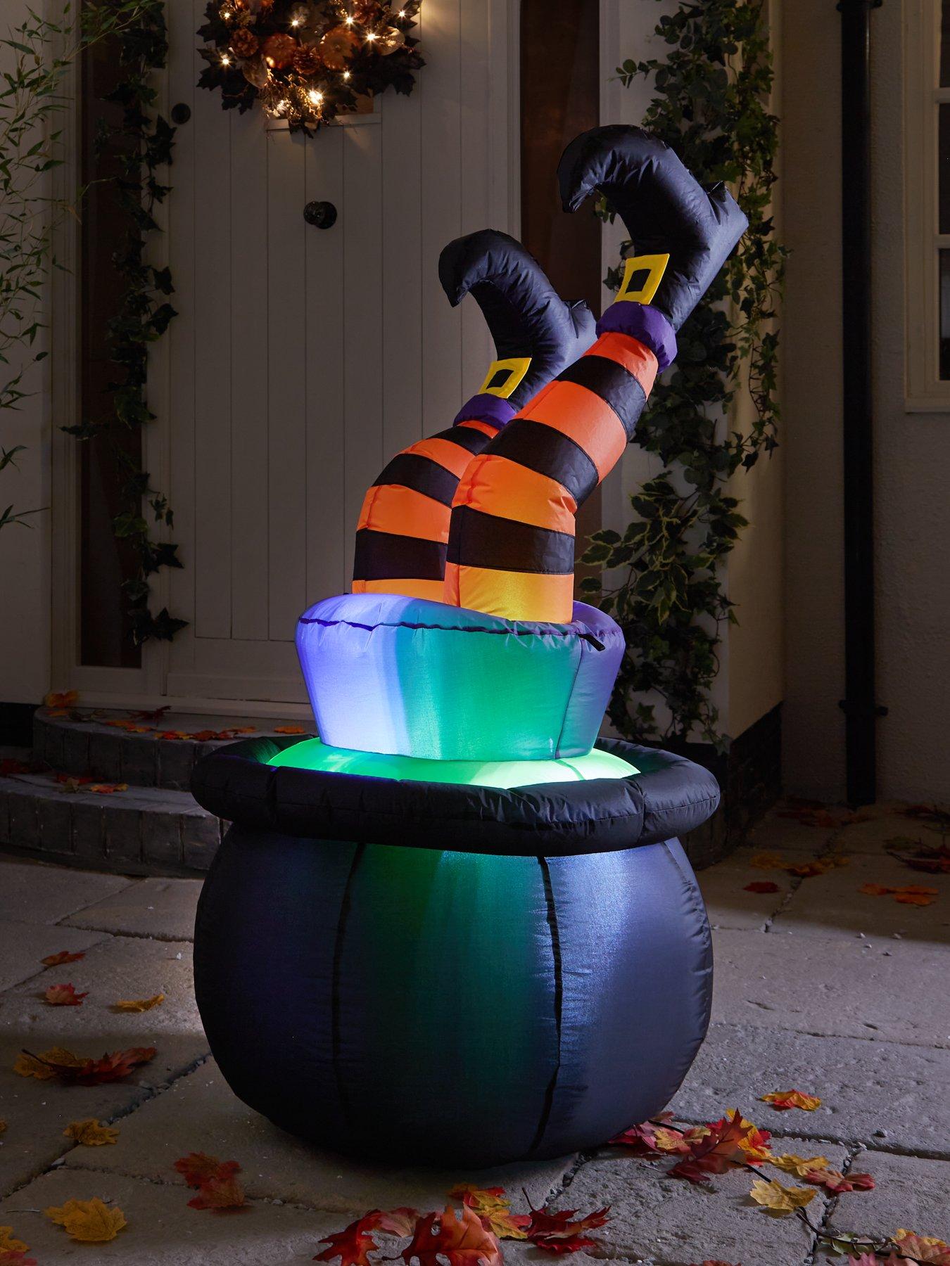 Product photograph of Festive Witch Legs Indoor Outdoor Inflatable Halloween Decoration from very.co.uk