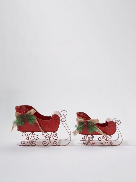 stillFront image of festive-set-of-2-red-metal-sleigh-christmas-decorations