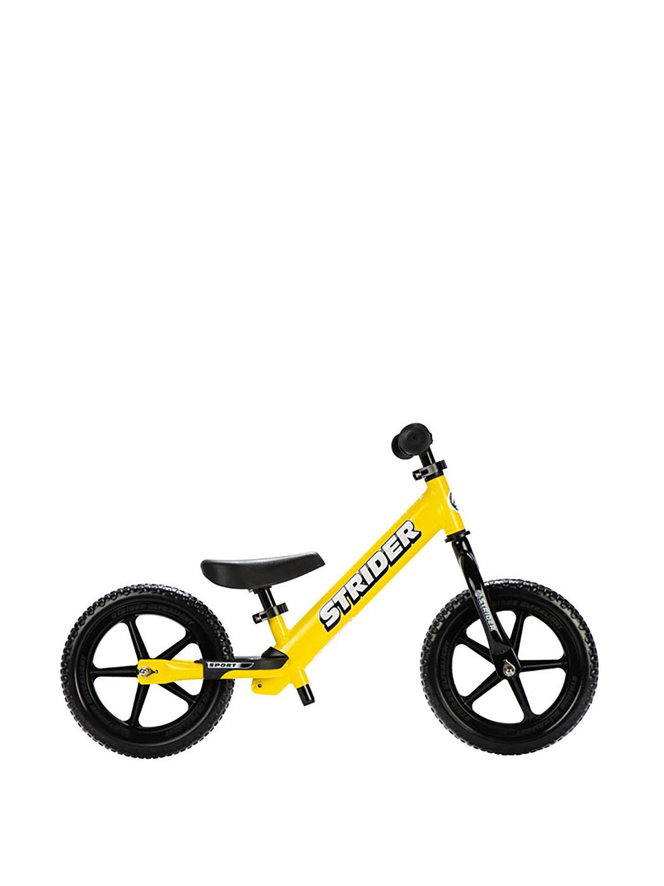 Yellow strider balance bike hot sale