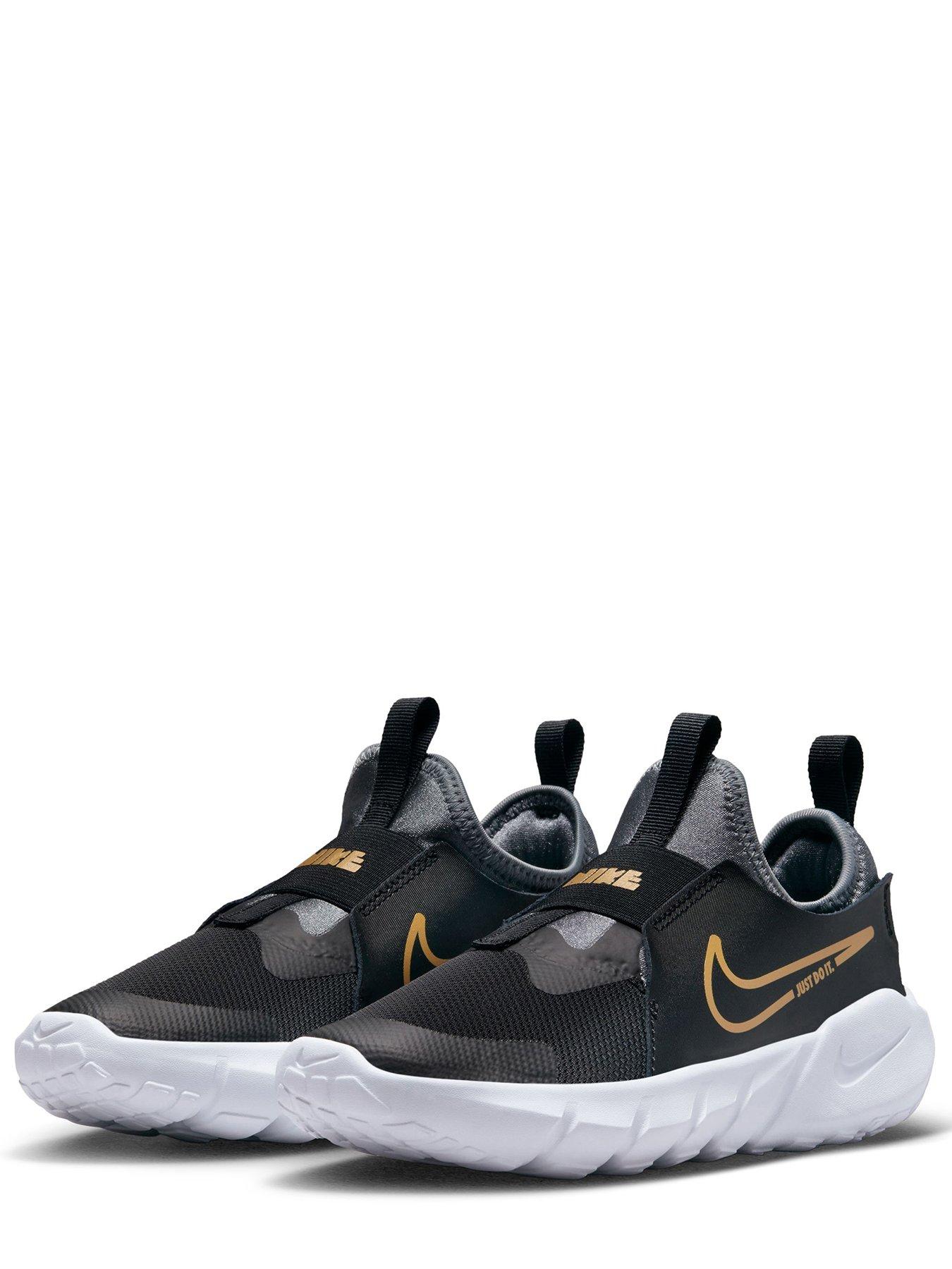 Nike black best sale and gold runners