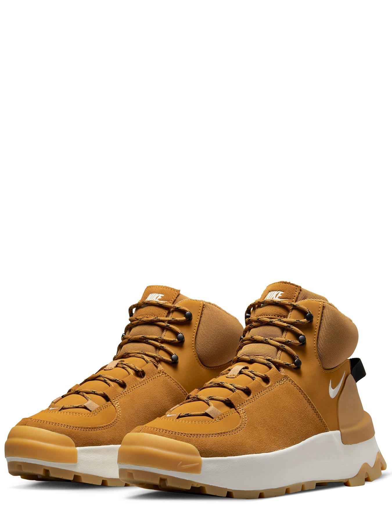 Beige nike boots store