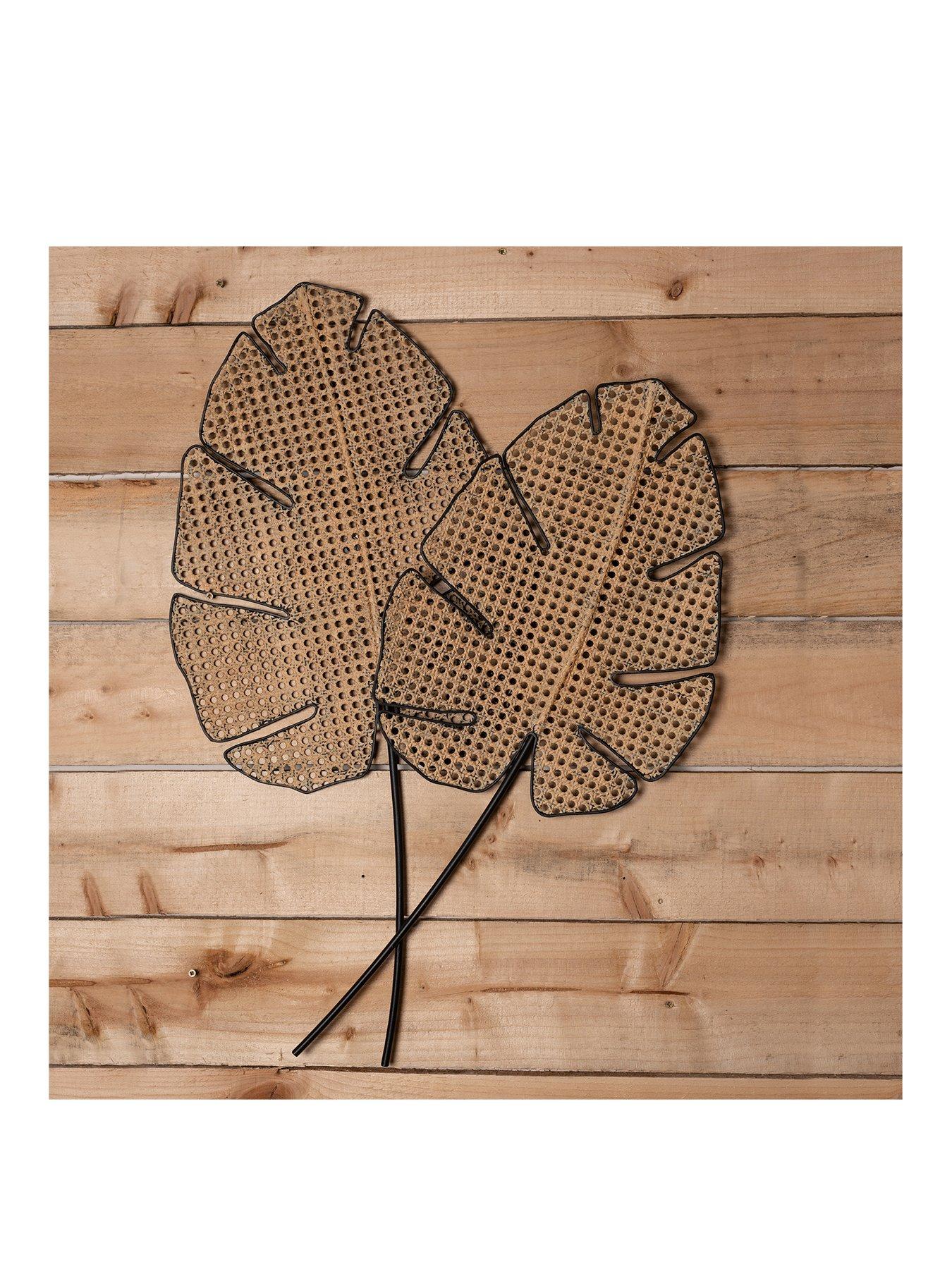 Product photograph of Hestia Rattan Leaf Metal Wall Art from very.co.uk