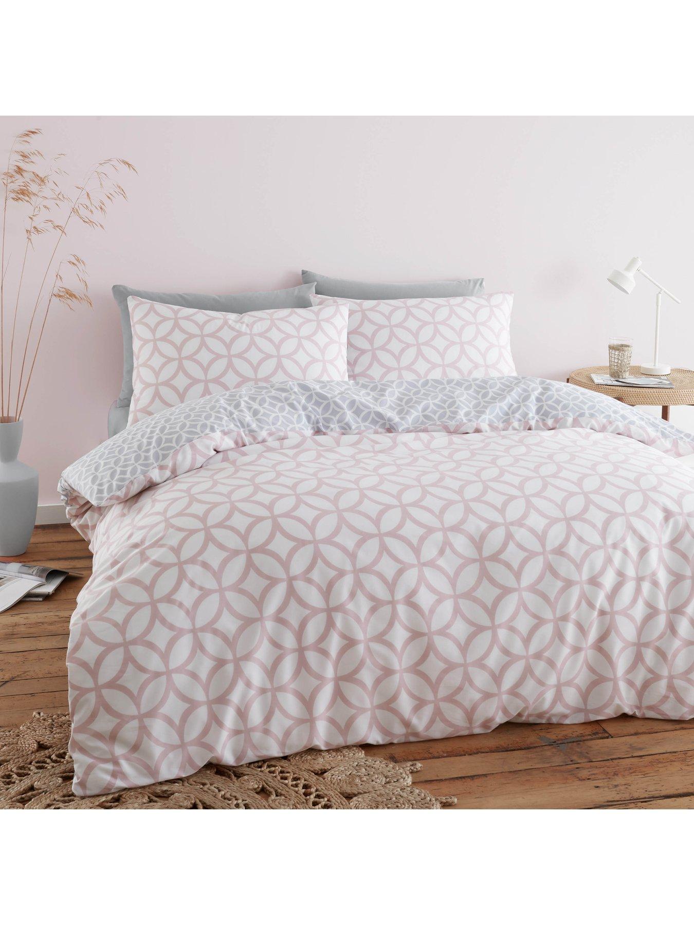 Product photograph of Catherine Lansfield Simplicity Geo Trellis Duvet Cover Set In Pink from very.co.uk