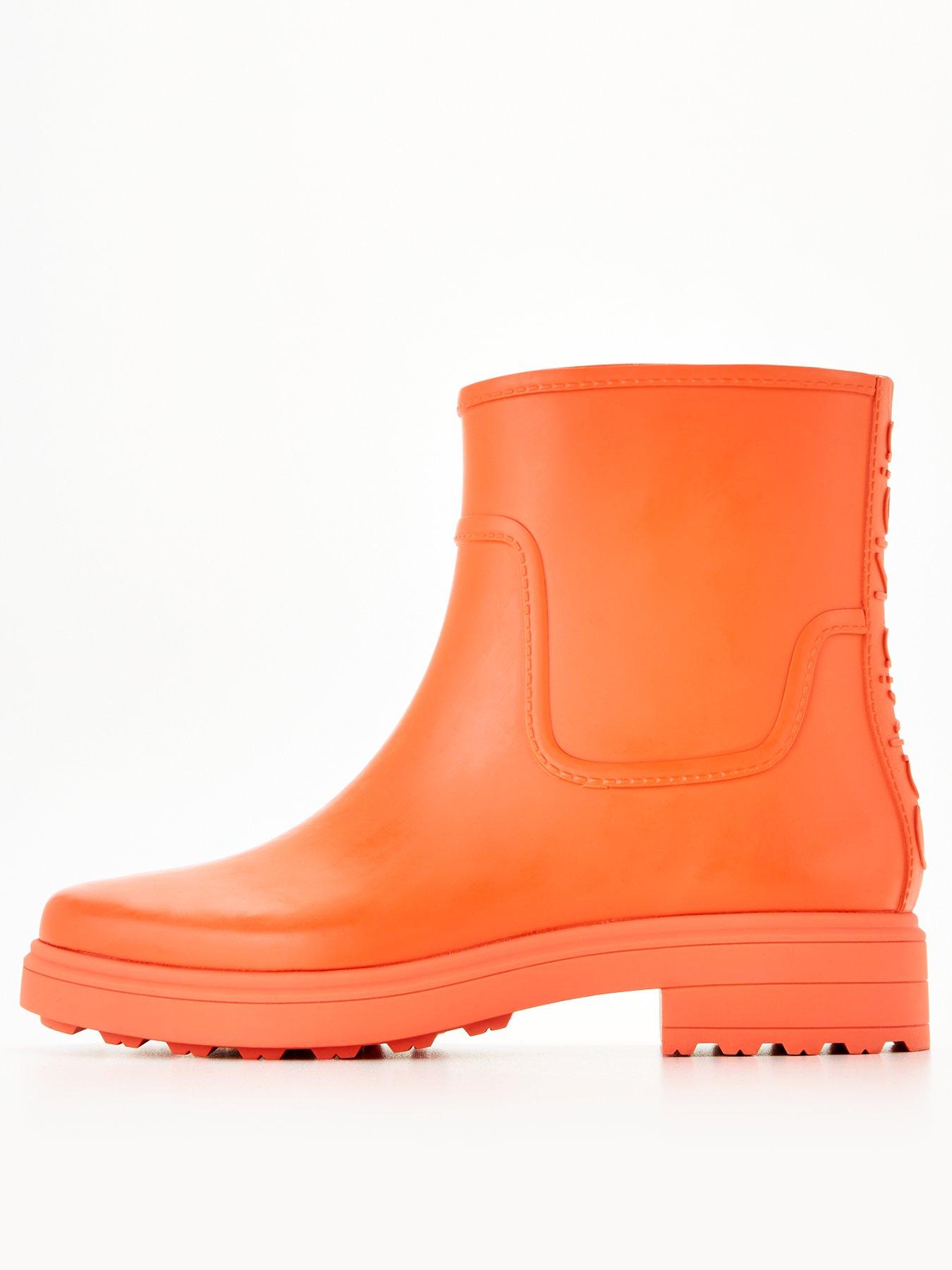 Calvin klein clearance orange rubber boots