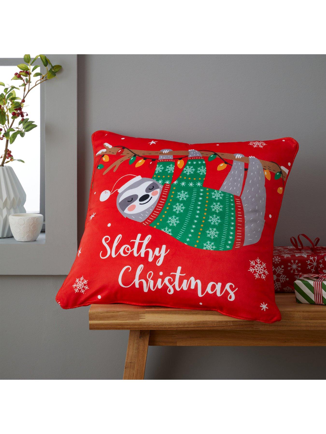 Product photograph of Catherine Lansfield Living Slothy Christmas Cushion Red from very.co.uk