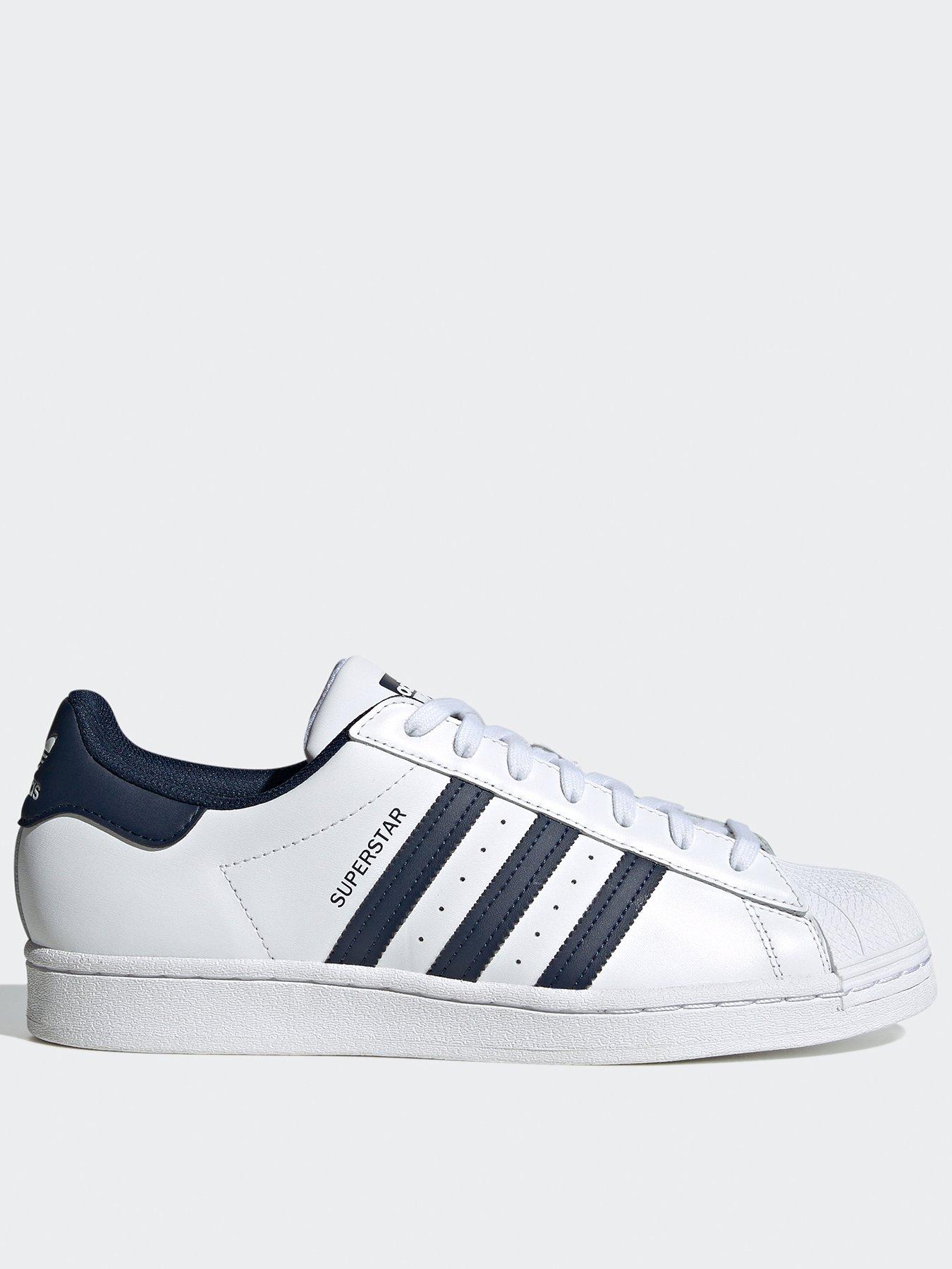 White and gold adidas on sale trainers