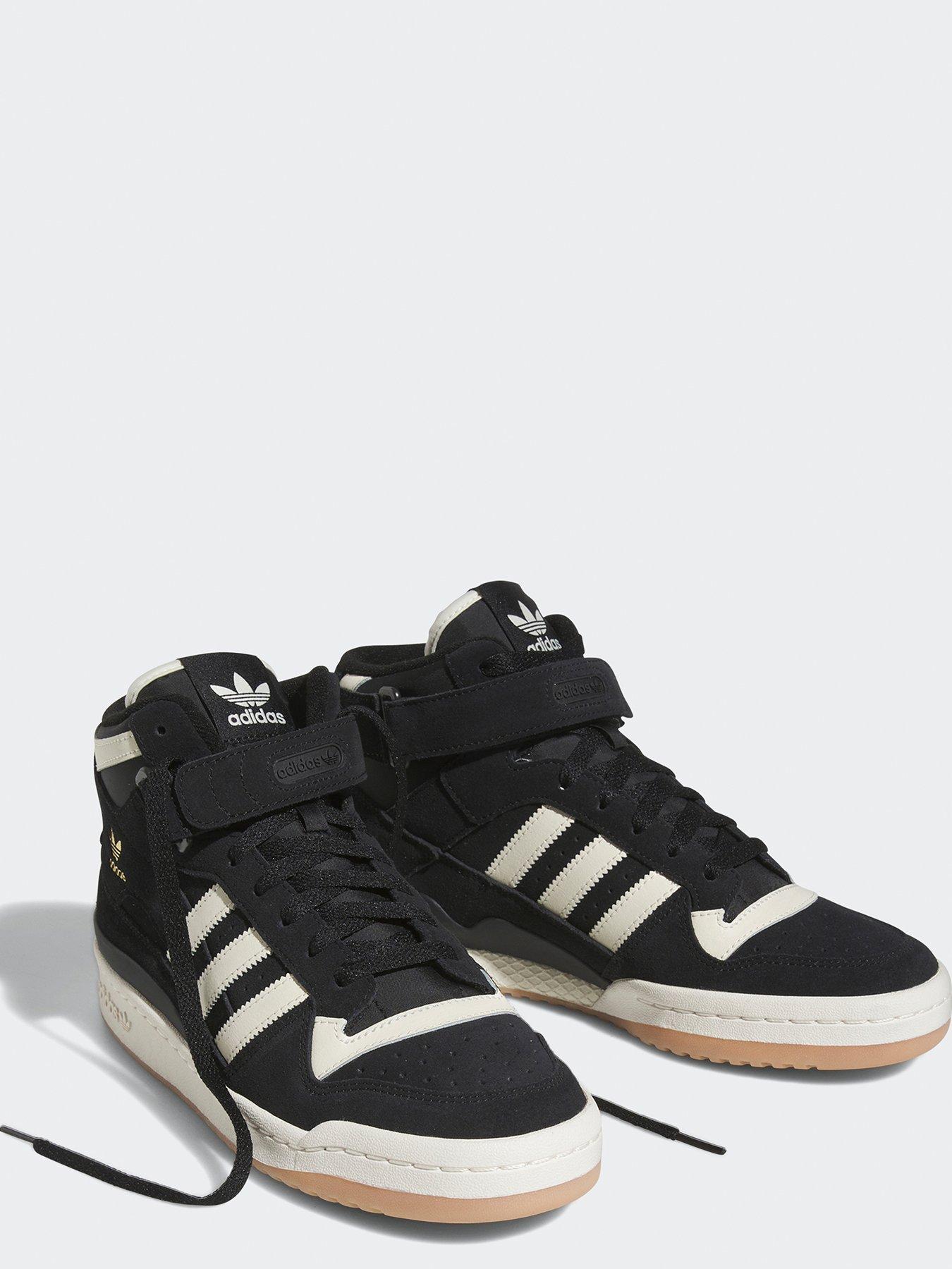 black mid top adidas