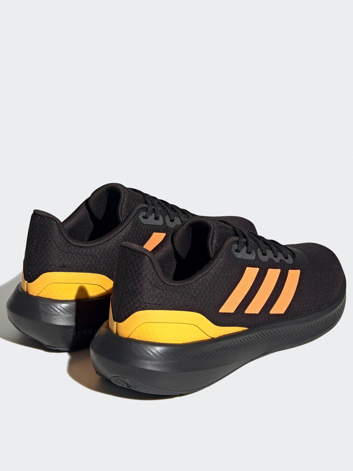 Adidas orange store and black trainers