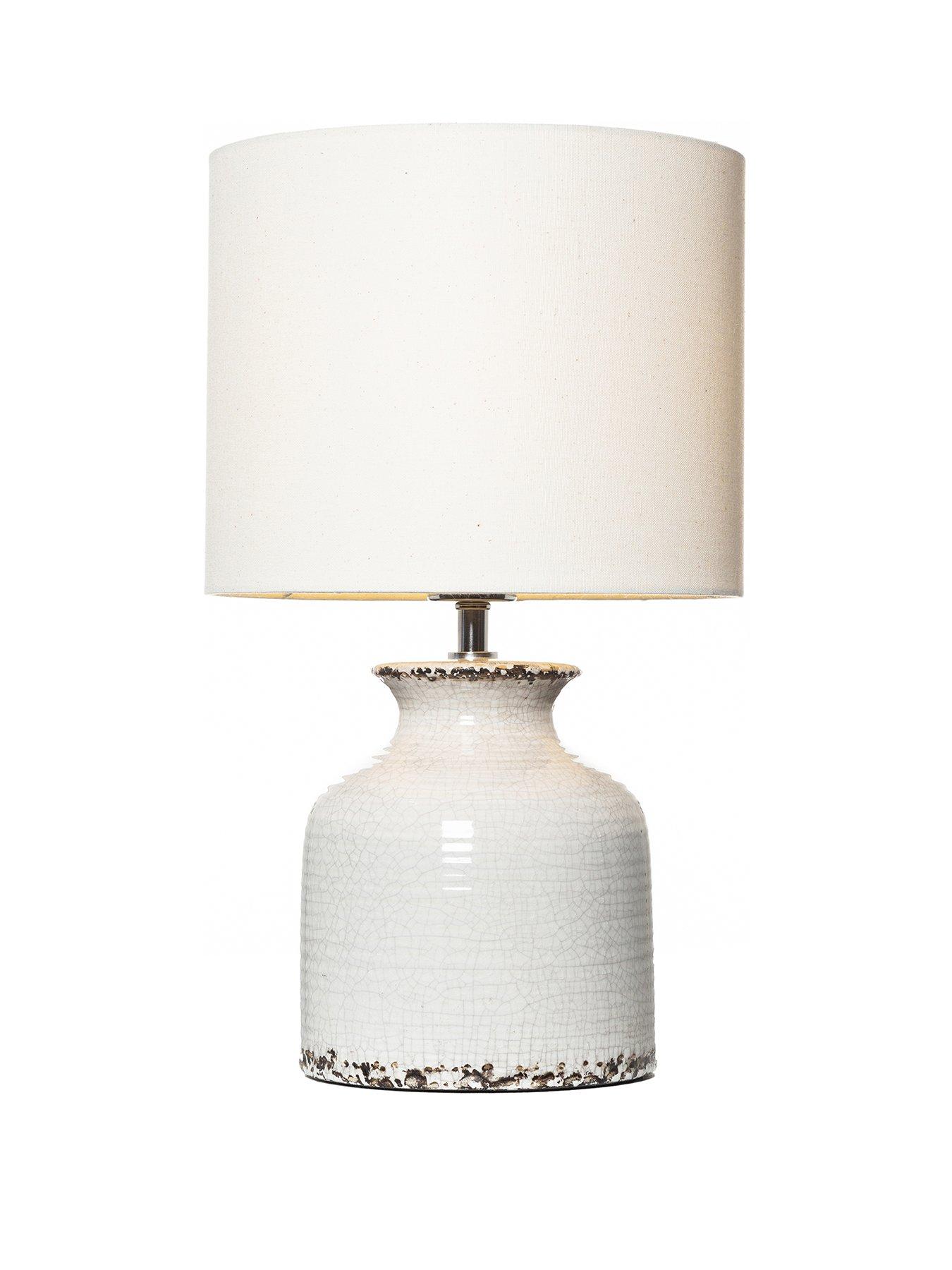 White ceramic store table lamp