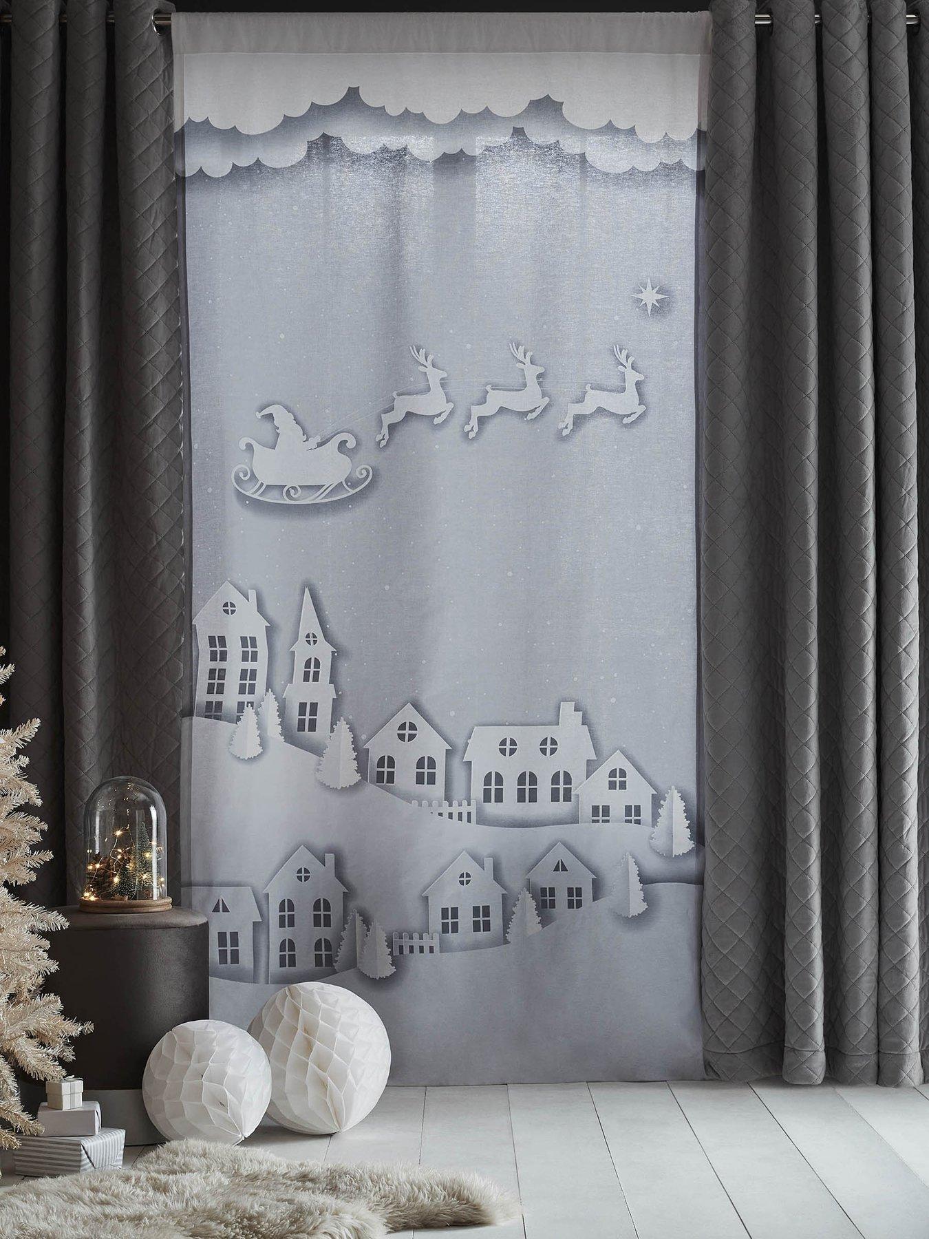 Product photograph of Catherine Lansfield Santas Christmas Roof Tops Panel Curtain from very.co.uk