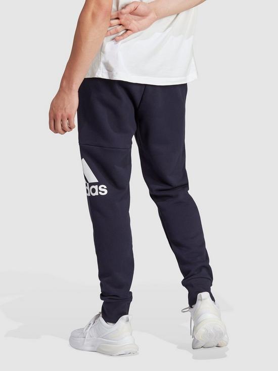 stillFront image of adidas-sportswear-essentials-french-terry-tapered-cuff-logo-joggers-navy