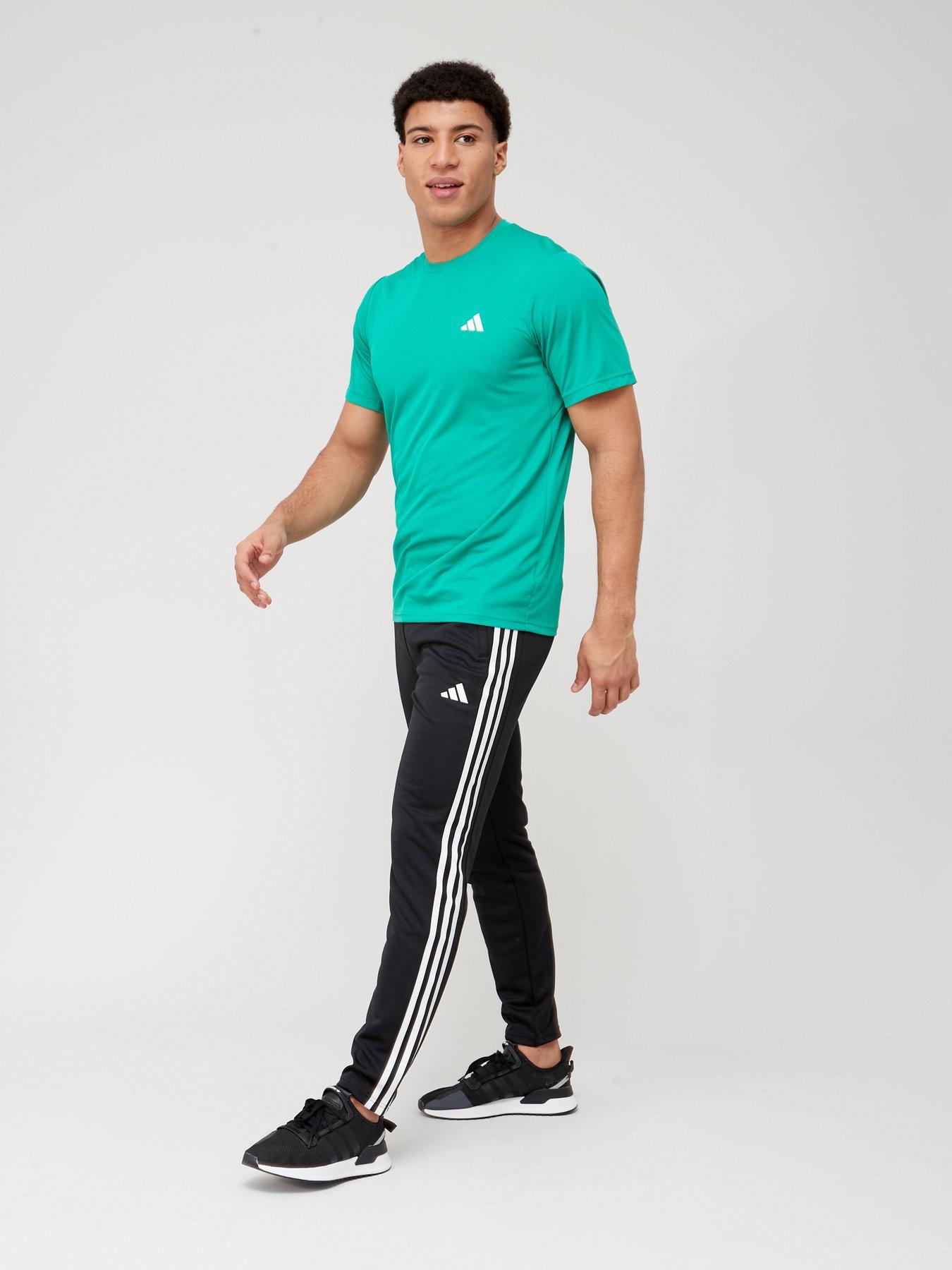 White adidas joggers discount with black stripes