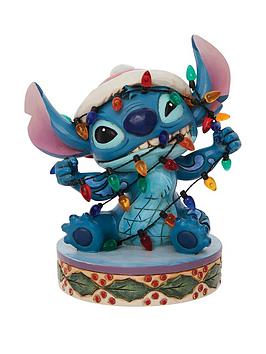 Product photograph of Disney Traditions Stitch Wrapped In Lights Figure from very.co.uk