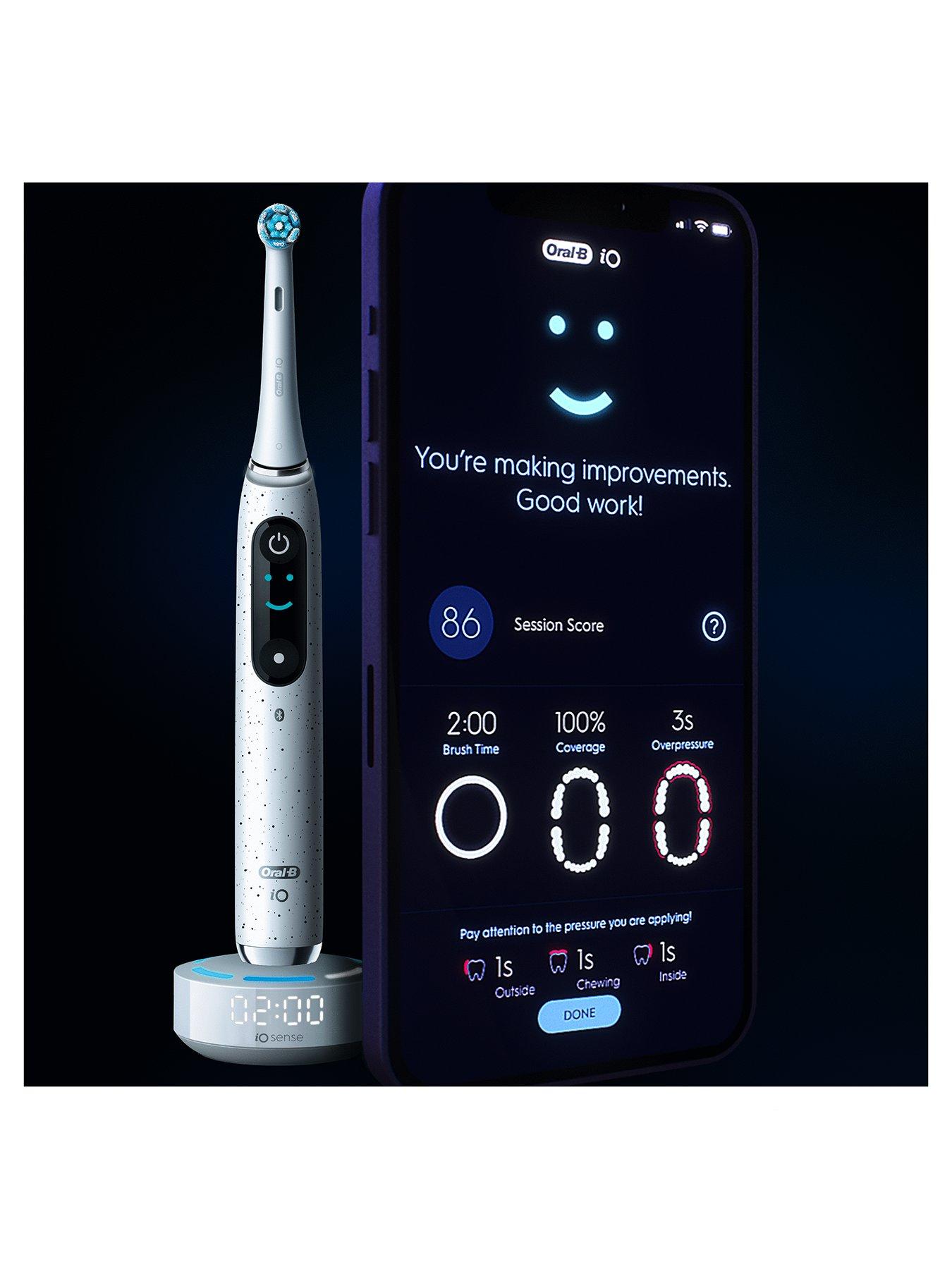 Image 2 of 3 of Oral-B iO10 Stardust White Electric Toothbrush + Charging Travel Case