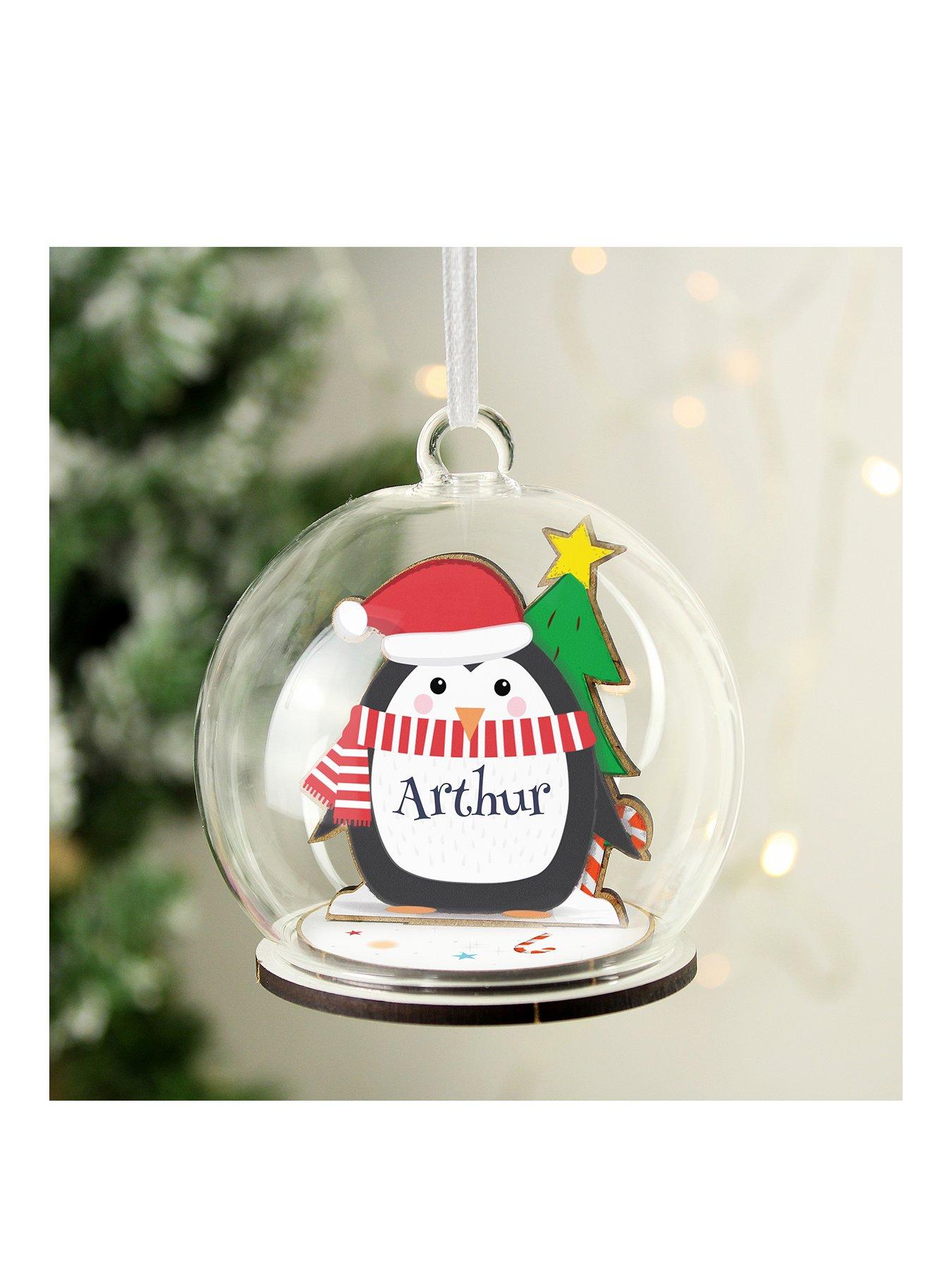 Product photograph of The Personalised Memento Company Wooden Penguin Glass Bauble from very.co.uk