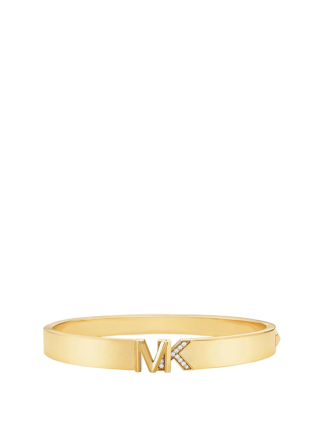 Product photograph of Michael Kors Metallic Muse Bangle- Gold from very.co.uk