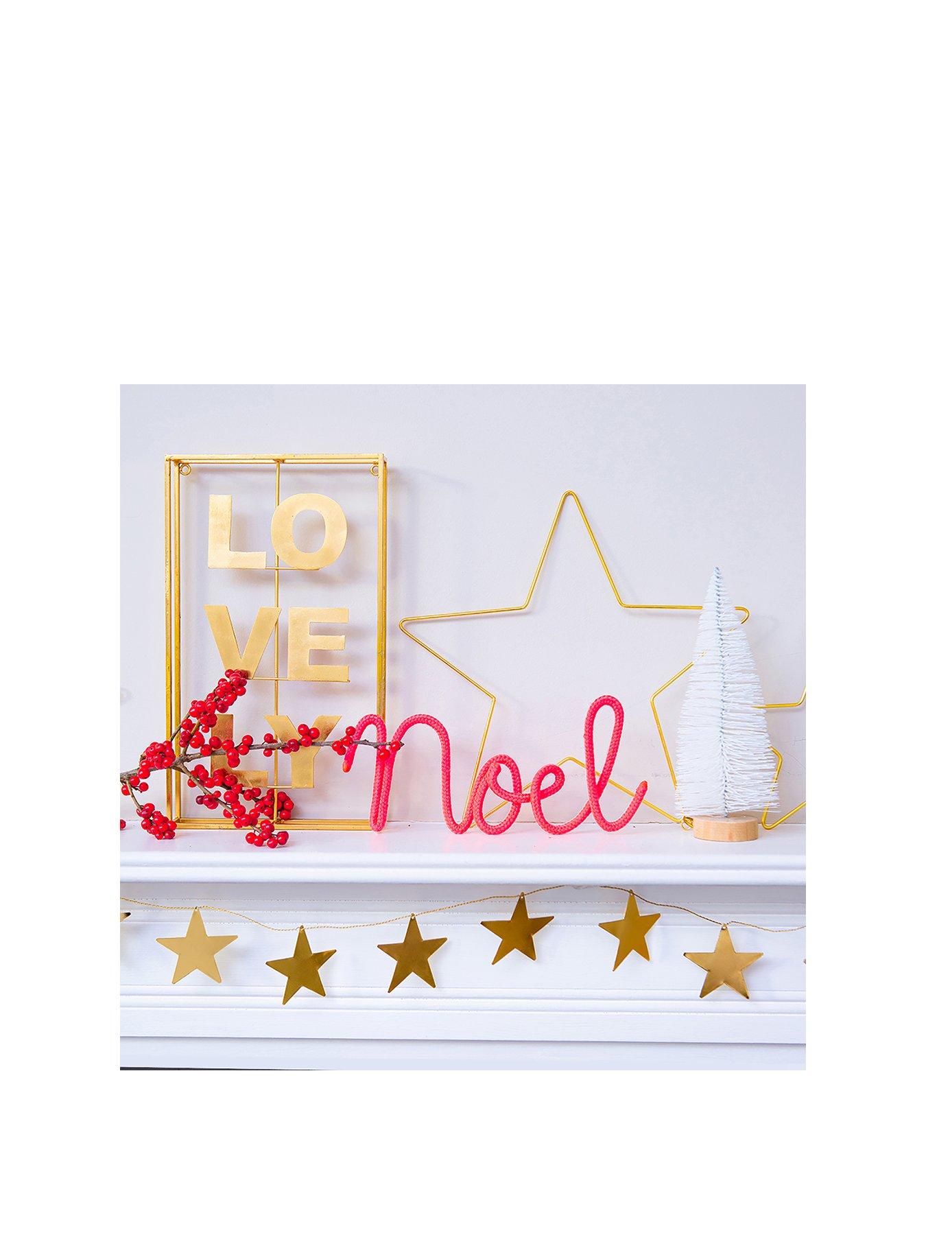 Product photograph of Bombay Duck Noel Rope Word Christmas Decoration - Neon Coral from very.co.uk