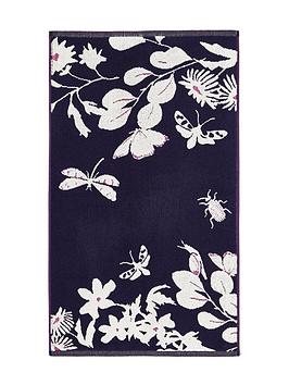 Product photograph of Joules Floral Beasts Bath Mat Navy from very.co.uk