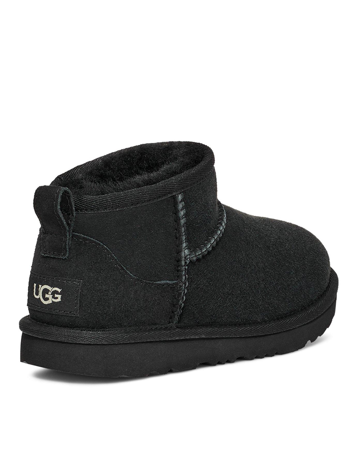 Black slip on sale uggs