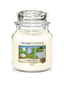 Product photograph of Yankee Candle Clean Cotton Medium Classic Jar Candle from very.co.uk