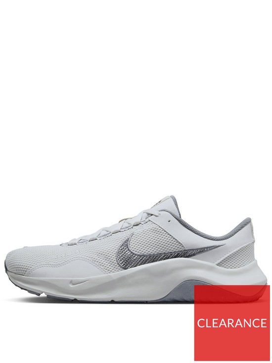 front image of nike-legend-essential-3-beigewhite