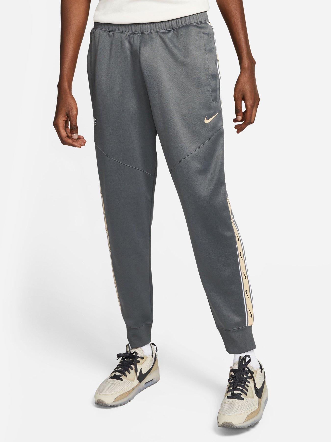 Nike track pants zippered clearance pockets