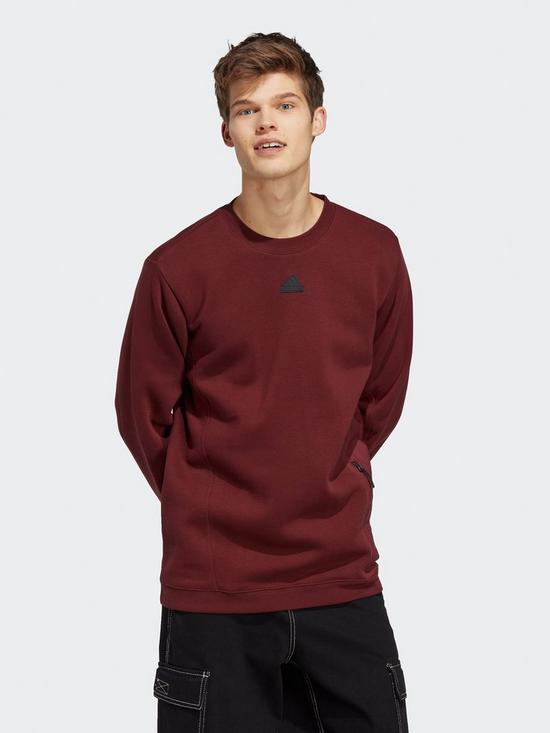 front image of adidas-sportswear-city-escape-sweatshirt-brown
