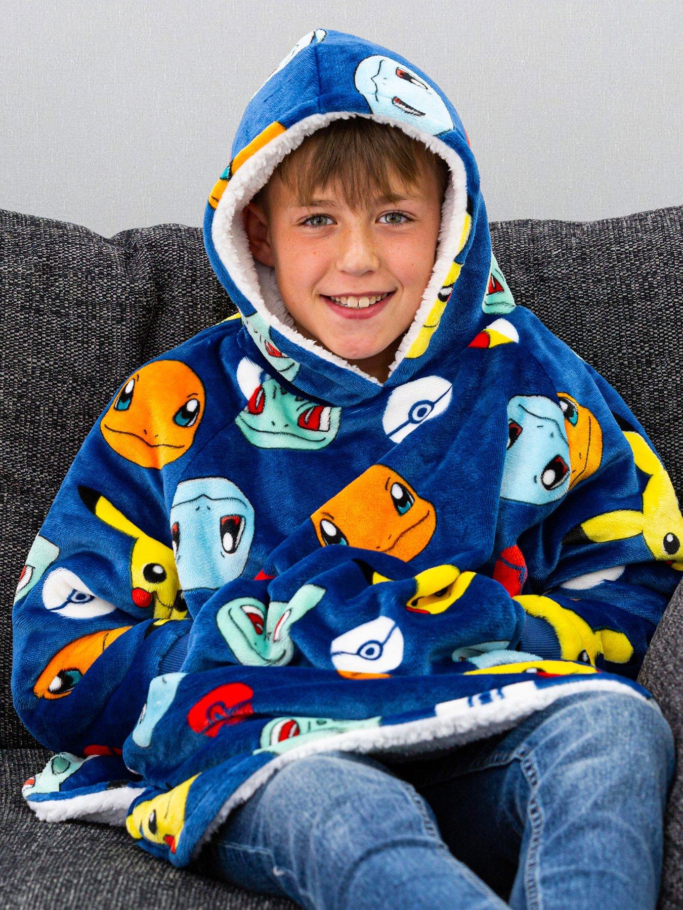 Product photograph of Pokemon Badges Wearable Fleece Medium - Blue from very.co.uk