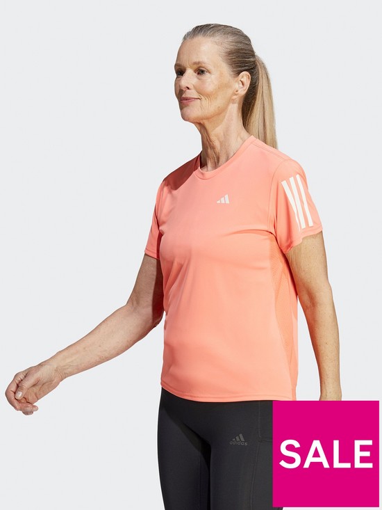 front image of adidas-womens-own-the-run-short-sleeve-top-pink