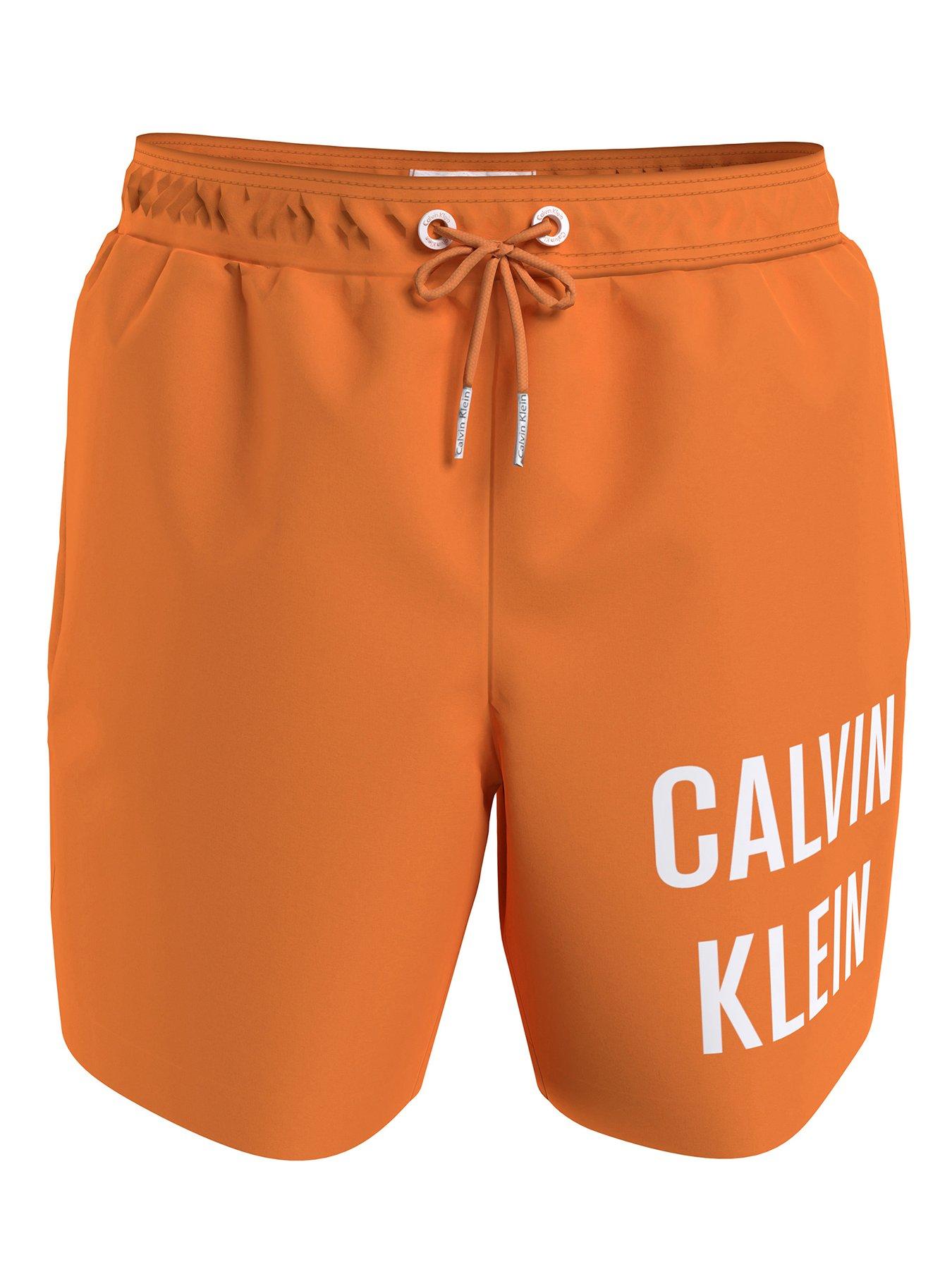 Orange calvin 2025 klein swim shorts