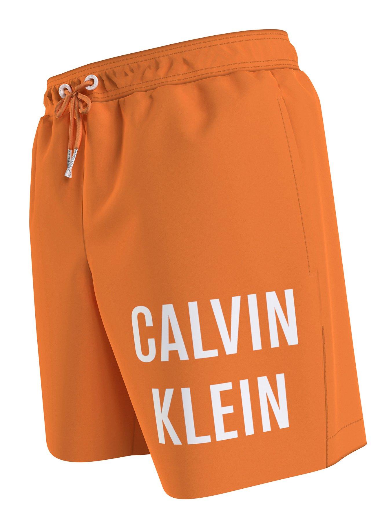 Calvin klein orange hot sale swim shorts