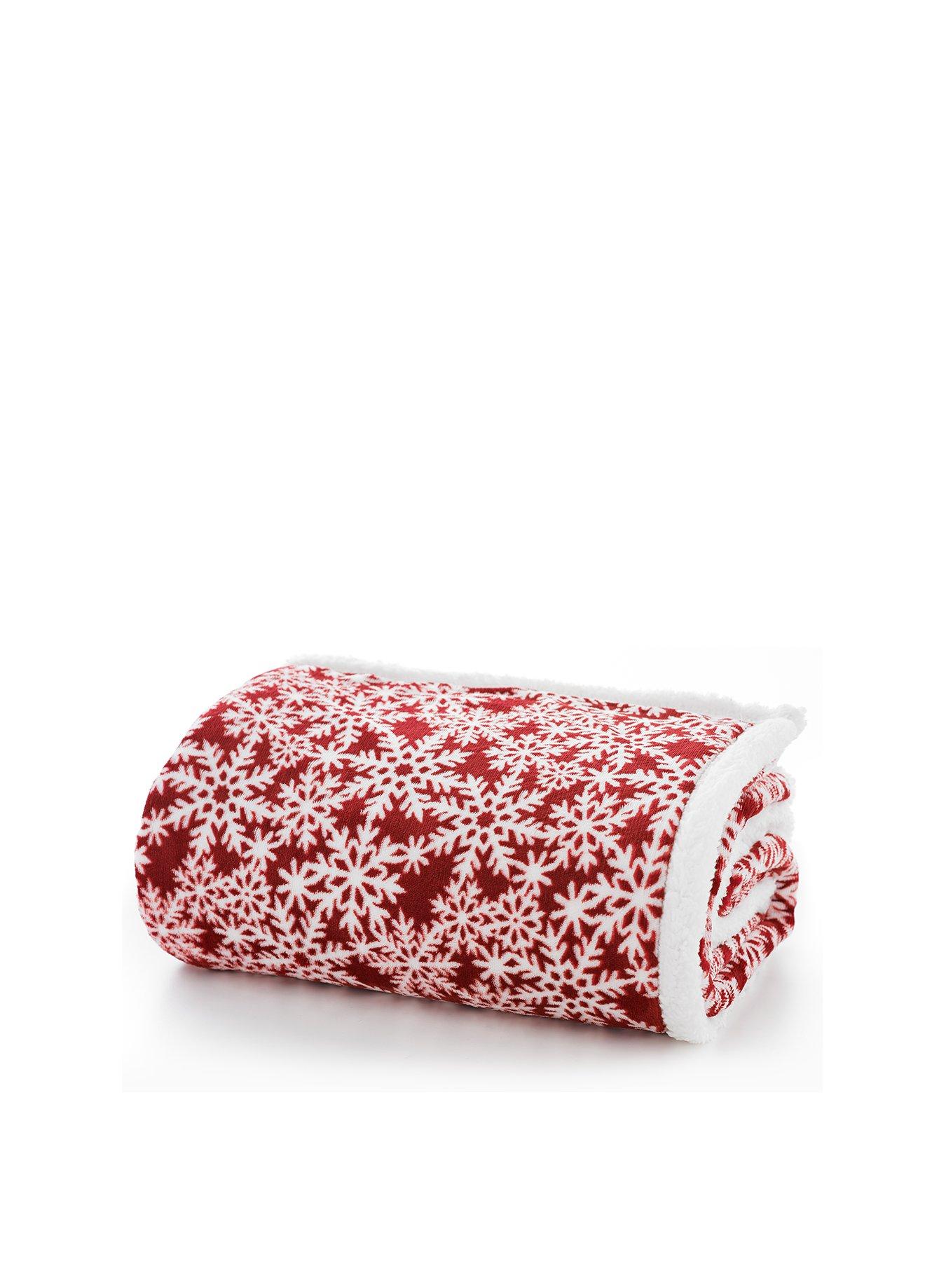 Product photograph of Deyongs Christmas Flakes Fleece Throw from very.co.uk