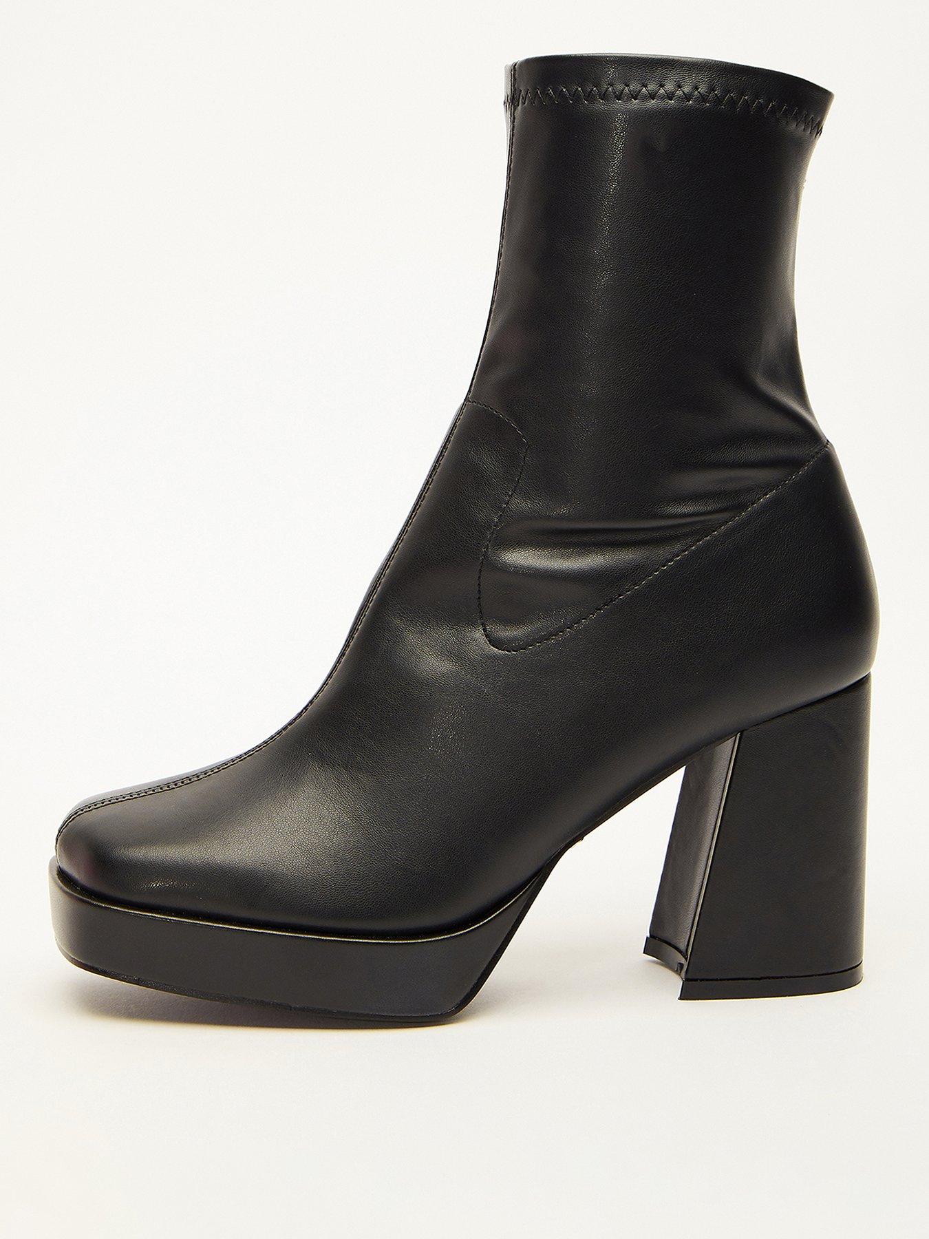 Platform heel outlet boots uk