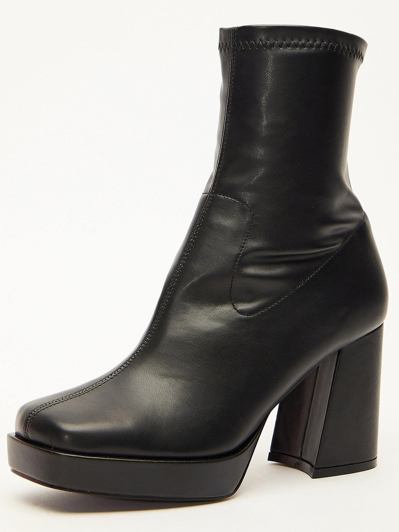 Platform heel best sale boots black