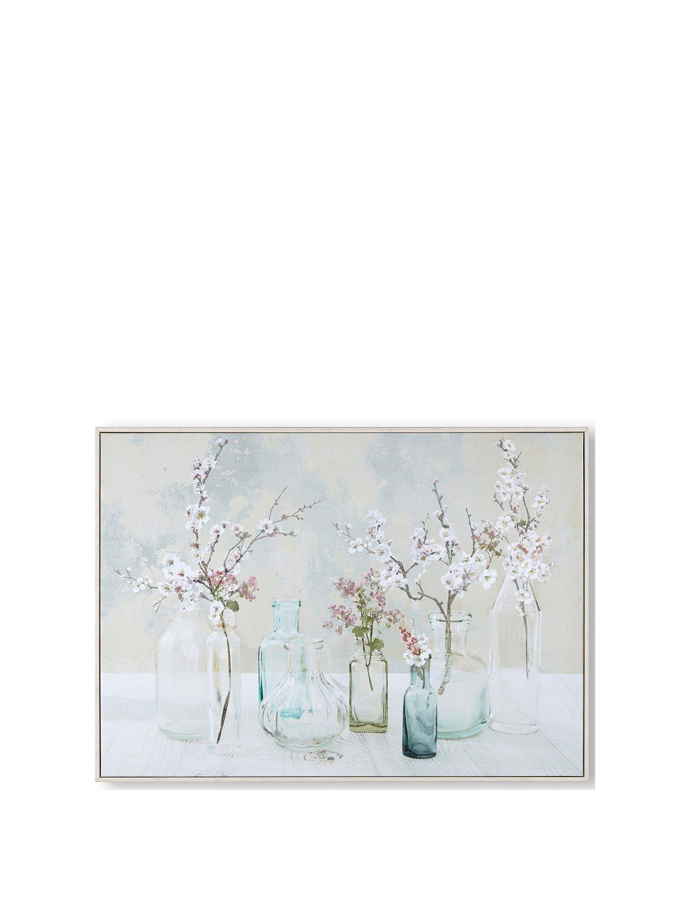 Product photograph of Art For The Home Apple Blossom Bottles Canvas Wall Art from very.co.uk