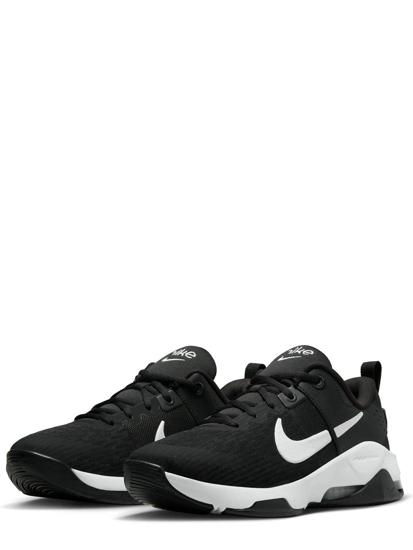 Girls black and white clearance nike trainers