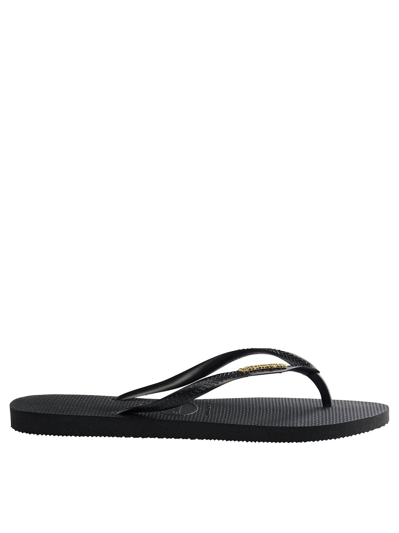 Black slim havaianas discount with gold logo