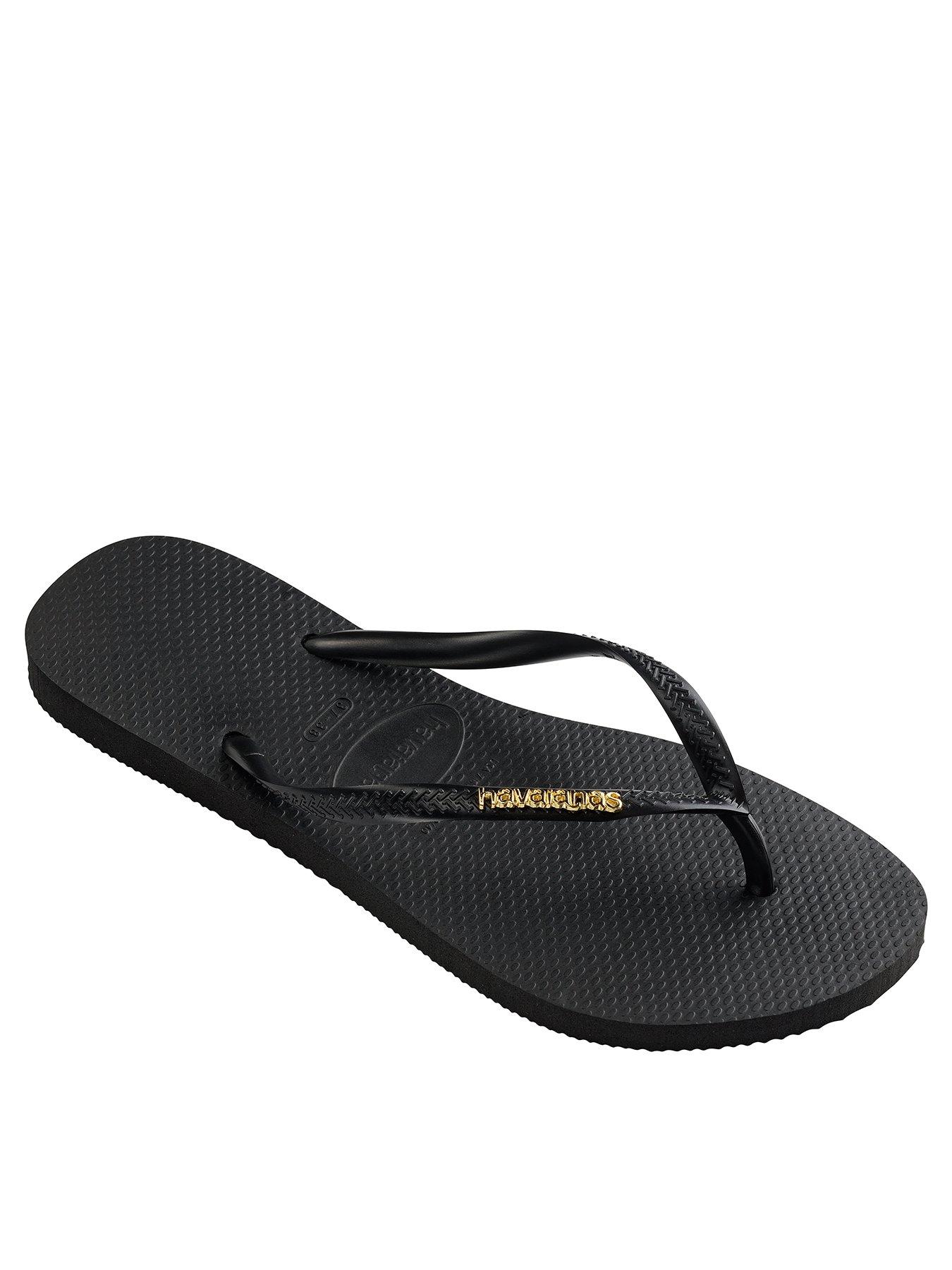 Black and cheap gold havaianas