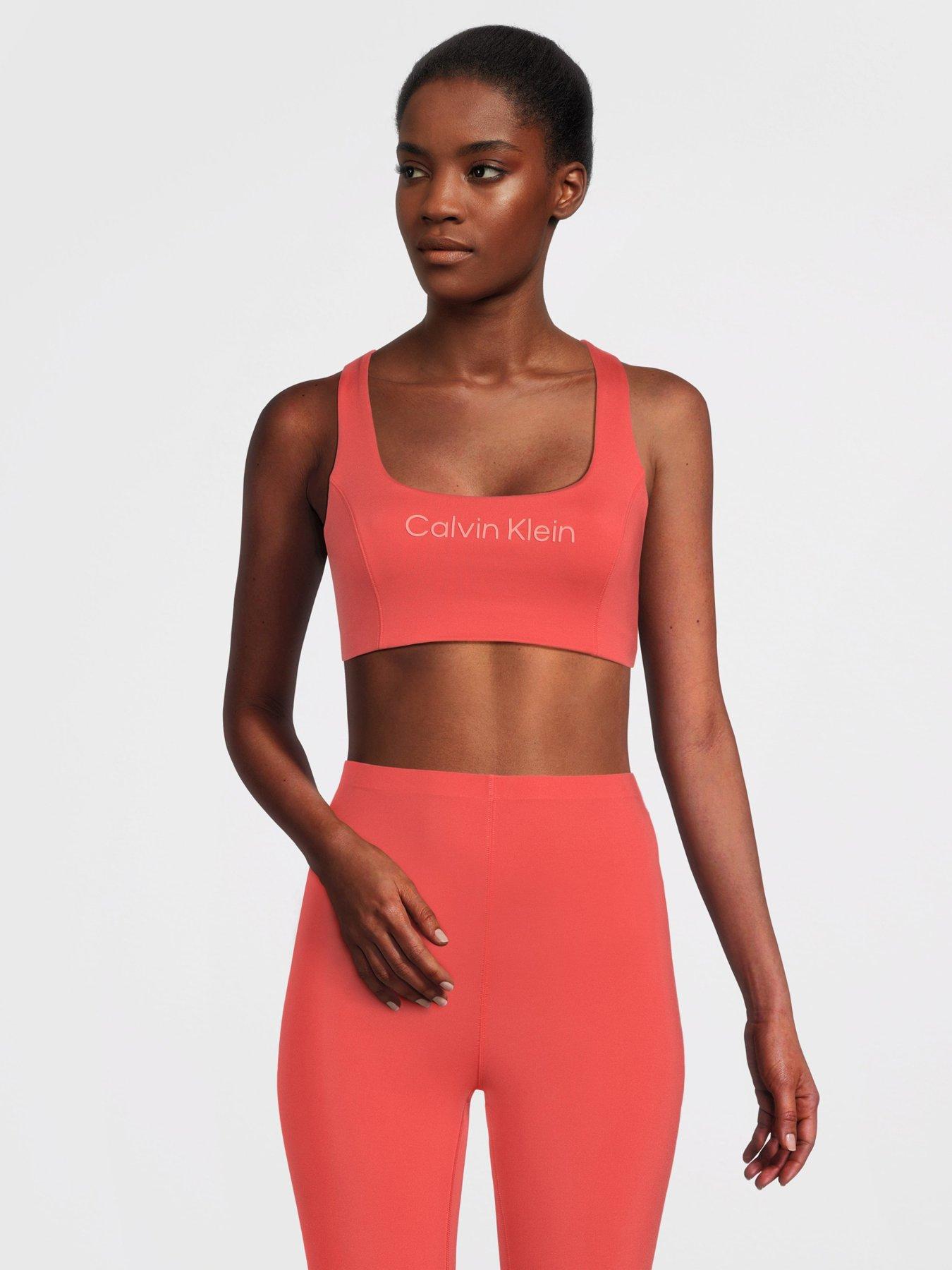 Calvin Klein Women's Performance Seamless Medium Impact Sports Bra - Orange  - XL
