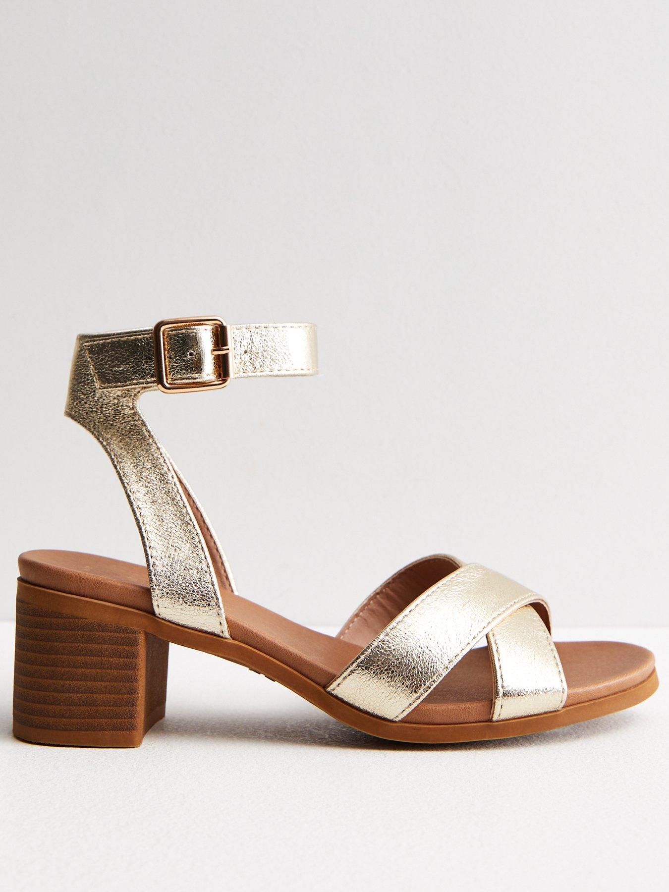 Gold cross best sale over sandals